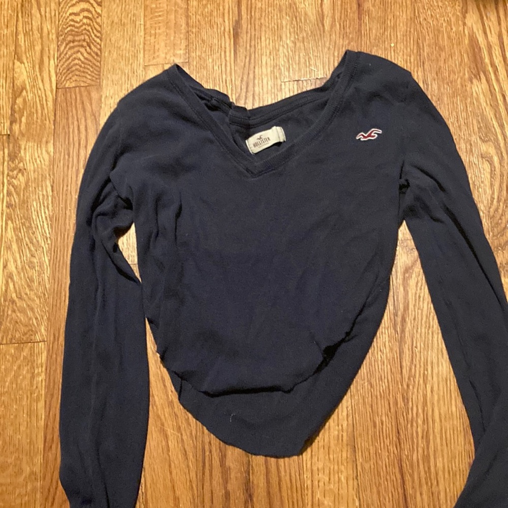 This is a size medium dark blue Hollister crop top long sleeve